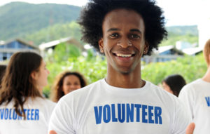 a man wearing a volunteer shirt